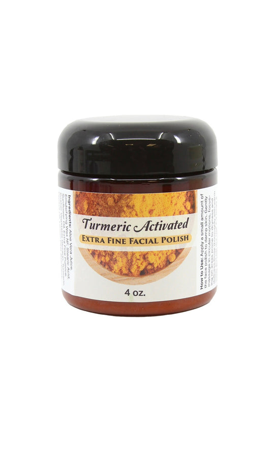 Jar of Turmeric Activated Extra Fine Facial Polish with a black lid on a white background